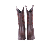 Brown embroidered cowboy boots, front view