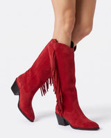 Red fringe cowboy boots on a model from another angle